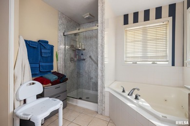 Welcome home to 4815 N. Weaverridge Boulevard! This 4-bedroom, 2 on WeaverRidge Golf Club in Illinois - for sale on GolfHomes.com, golf home, golf lot