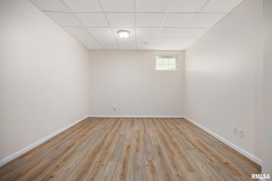 Welcome home to 4815 N. Weaverridge Boulevard! This 4-bedroom, 2 on WeaverRidge Golf Club in Illinois - for sale on GolfHomes.com, golf home, golf lot