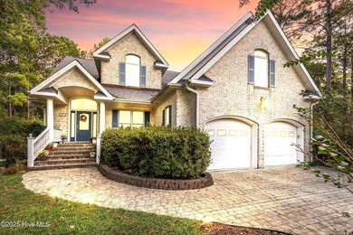 Welcome to this stunning 2,934 sq. ft. custom-built brick home on Carolina National Golf Club in North Carolina - for sale on GolfHomes.com, golf home, golf lot