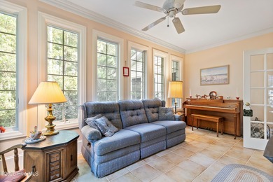 Welcome to this stunning 2,934 sq. ft. custom-built brick home on Carolina National Golf Club in North Carolina - for sale on GolfHomes.com, golf home, golf lot