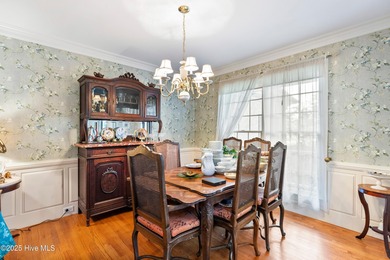 Welcome to this stunning 2,934 sq. ft. custom-built brick home on Carolina National Golf Club in North Carolina - for sale on GolfHomes.com, golf home, golf lot