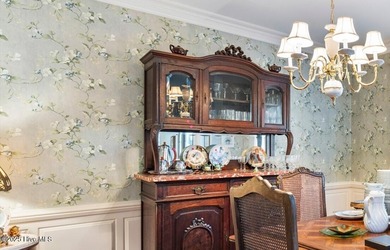 Welcome to this stunning 2,934 sq. ft. custom-built brick home on Carolina National Golf Club in North Carolina - for sale on GolfHomes.com, golf home, golf lot