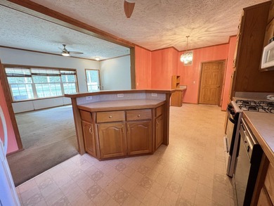 Experience the relaxed Ozark lifestyle just minutes from the on Cherokee Village North Course in Arkansas - for sale on GolfHomes.com, golf home, golf lot