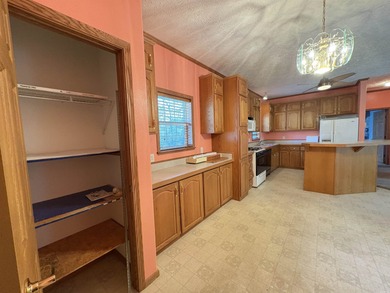 Experience the relaxed Ozark lifestyle just minutes from the on Cherokee Village North Course in Arkansas - for sale on GolfHomes.com, golf home, golf lot