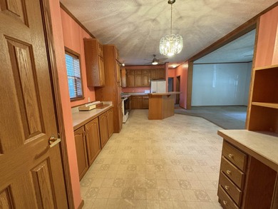 Experience the relaxed Ozark lifestyle just minutes from the on Cherokee Village North Course in Arkansas - for sale on GolfHomes.com, golf home, golf lot