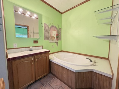 Experience the relaxed Ozark lifestyle just minutes from the on Cherokee Village North Course in Arkansas - for sale on GolfHomes.com, golf home, golf lot