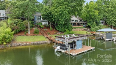 Experience Spectacular Lakefront living w/ this one-of-a-kind on Tega Cay Golf Club in South Carolina - for sale on GolfHomes.com, golf home, golf lot