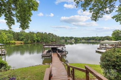 Experience Spectacular Lakefront living w/ this one-of-a-kind on Tega Cay Golf Club in South Carolina - for sale on GolfHomes.com, golf home, golf lot