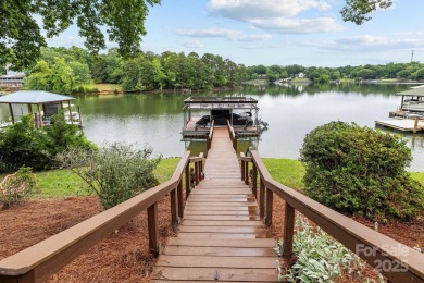 Experience Spectacular Lakefront living w/ this one-of-a-kind on Tega Cay Golf Club in South Carolina - for sale on GolfHomes.com, golf home, golf lot
