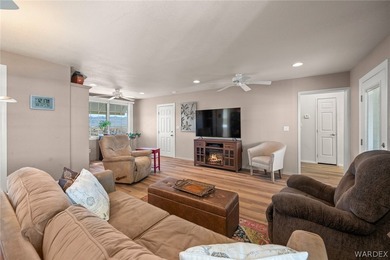 STUNNING EXTRA WIDE HOME ON AN OVERSIZED LOT WITH DESERT VIEWS on Riverview Golf Course in Arizona - for sale on GolfHomes.com, golf home, golf lot