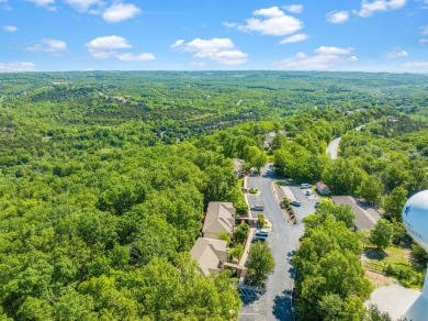 Welcome to your getaway in the highly sought-after Stonebridge on Ledgestone Country Club and Golf Course in Missouri - for sale on GolfHomes.com, golf home, golf lot