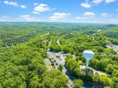 Welcome to your getaway in the highly sought-after Stonebridge on Ledgestone Country Club and Golf Course in Missouri - for sale on GolfHomes.com, golf home, golf lot