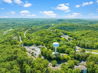 Welcome to your getaway in the highly sought-after Stonebridge on Ledgestone Country Club and Golf Course in Missouri - for sale on GolfHomes.com, golf home, golf lot