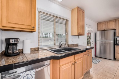 Lovely 2-bedroom, 2 full bath home in the sought-after Sun City on PalmBrook Country Club in Arizona - for sale on GolfHomes.com, golf home, golf lot