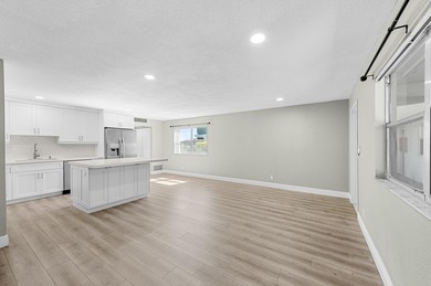 Experience resort-style living in this beautifully renovated on Kings Point Golf -Flanders Way in Florida - for sale on GolfHomes.com, golf home, golf lot