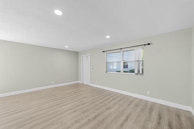 Experience resort-style living in this beautifully renovated on Kings Point Golf -Flanders Way in Florida - for sale on GolfHomes.com, golf home, golf lot