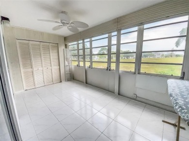Enjoy South Florida living with this 2Bed/2Bath second floor on Hillsboro Pines Golf in Florida - for sale on GolfHomes.com, golf home, golf lot