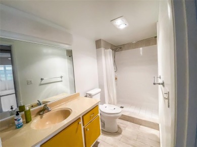 Enjoy South Florida living with this 2Bed/2Bath second floor on Hillsboro Pines Golf in Florida - for sale on GolfHomes.com, golf home, golf lot