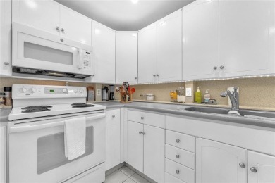 Enjoy South Florida living with this 2Bed/2Bath second floor on Hillsboro Pines Golf in Florida - for sale on GolfHomes.com, golf home, golf lot