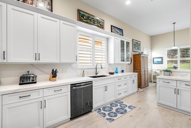 Welcome to this beautifully updated 3-bedroom, 2-bath home on Gleneagles Golf and Country Club in Florida - for sale on GolfHomes.com, golf home, golf lot