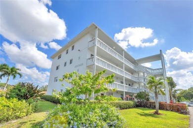 Enjoy South Florida living with this 2Bed/2Bath second floor on Hillsboro Pines Golf in Florida - for sale on GolfHomes.com, golf home, golf lot