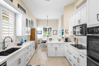 Welcome to this beautifully updated 3-bedroom, 2-bath home on Gleneagles Golf and Country Club in Florida - for sale on GolfHomes.com, golf home, golf lot