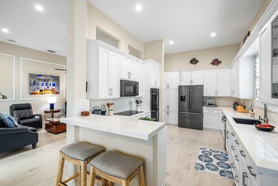 Welcome to this beautifully updated 3-bedroom, 2-bath home on Gleneagles Golf and Country Club in Florida - for sale on GolfHomes.com, golf home, golf lot