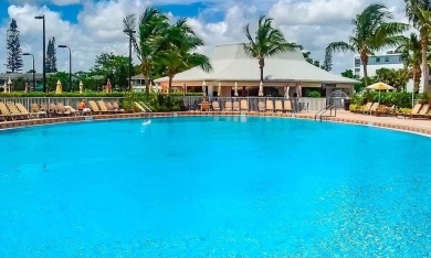 Enjoy South Florida living with this 2Bed/2Bath second floor on Hillsboro Pines Golf in Florida - for sale on GolfHomes.com, golf home, golf lot