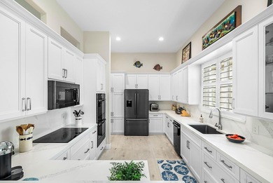 Welcome to this beautifully updated 3-bedroom, 2-bath home on Gleneagles Golf and Country Club in Florida - for sale on GolfHomes.com, golf home, golf lot
