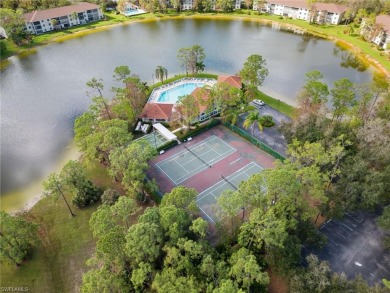 UPDATED KITCHEN WITH QUARTZ COUNTERS, IMPACT WINDOWS AND SLIDERS on Royal Wood Golf and Country Club in Florida - for sale on GolfHomes.com, golf home, golf lot