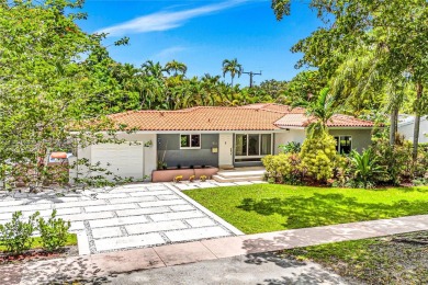 Set on a quiet, tree-lined street, this beautifully updated on Granada Golf Club in Florida - for sale on GolfHomes.com, golf home, golf lot