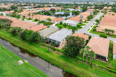 Welcome to this beautifully updated 3-bedroom, 2-bath home on Gleneagles Golf and Country Club in Florida - for sale on GolfHomes.com, golf home, golf lot