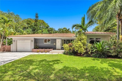Set on a quiet, tree-lined street, this beautifully updated on Granada Golf Club in Florida - for sale on GolfHomes.com, golf home, golf lot
