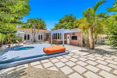 Set on a quiet, tree-lined street, this beautifully updated on Granada Golf Club in Florida - for sale on GolfHomes.com, golf home, golf lot