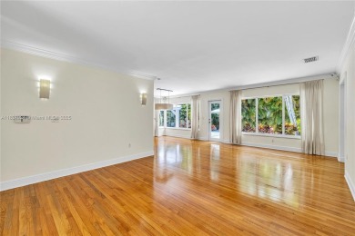 Set on a quiet, tree-lined street, this beautifully updated on Granada Golf Club in Florida - for sale on GolfHomes.com, golf home, golf lot
