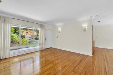 Set on a quiet, tree-lined street, this beautifully updated on Granada Golf Club in Florida - for sale on GolfHomes.com, golf home, golf lot