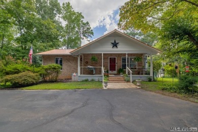 A Delightful Lake House with lots of extras!  A beautiful on Tanglewood Shores Golf and Country Club in Virginia - for sale on GolfHomes.com, golf home, golf lot