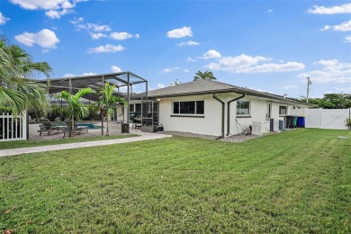 BEAUTIFULLY CURATED GOLF COURSE HOME TEE'D UP FOR HURRICANE on Seminole Lake Country Club in Florida - for sale on GolfHomes.com, golf home, golf lot