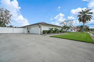 BEAUTIFULLY CURATED GOLF COURSE HOME TEE'D UP FOR HURRICANE on Seminole Lake Country Club in Florida - for sale on GolfHomes.com, golf home, golf lot