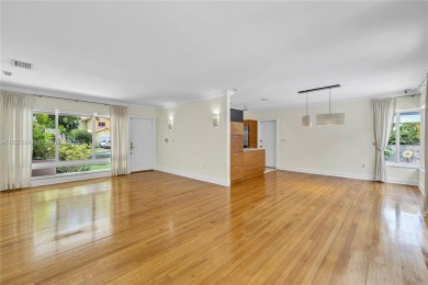 Set on a quiet, tree-lined street, this beautifully updated on Granada Golf Club in Florida - for sale on GolfHomes.com, golf home, golf lot