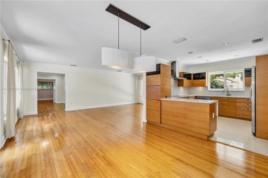 Set on a quiet, tree-lined street, this beautifully updated on Granada Golf Club in Florida - for sale on GolfHomes.com, golf home, golf lot