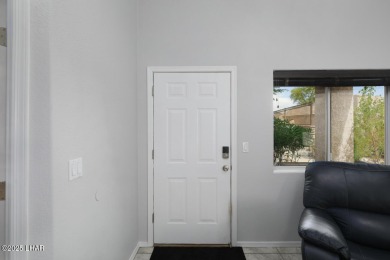 Beautiful ground floor 2 bedroom, 2 bath condo, with a garage on London Bridge Golf Course in Arizona - for sale on GolfHomes.com, golf home, golf lot