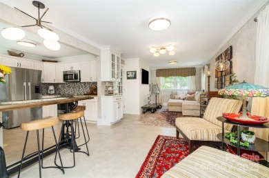 This storybook home offers character, charm, and a backyard on Rock Hill Country Club in South Carolina - for sale on GolfHomes.com, golf home, golf lot