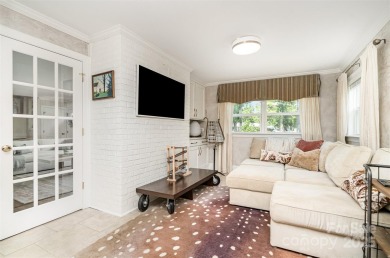 This storybook home offers character, charm, and a backyard on Rock Hill Country Club in South Carolina - for sale on GolfHomes.com, golf home, golf lot