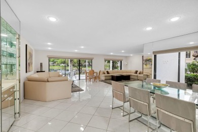 Enjoy serene water views from this light and bright first-floor on Hunters Run Golf and Country Club in Florida - for sale on GolfHomes.com, golf home, golf lot
