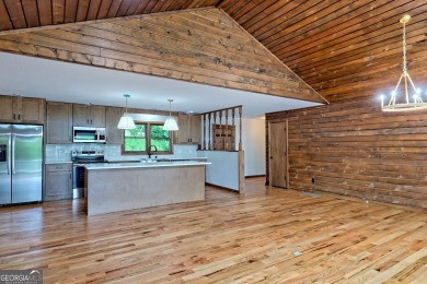 This beautiful completely remolded Home in Sky Valley offers one on Sky Valley Resort and Country Club in Georgia - for sale on GolfHomes.com, golf home, golf lot
