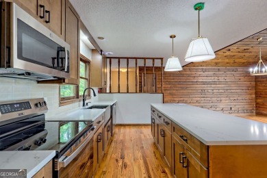 This beautiful completely remolded Home in Sky Valley offers one on Sky Valley Resort and Country Club in Georgia - for sale on GolfHomes.com, golf home, golf lot