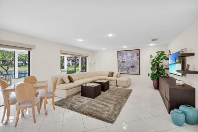 Enjoy serene water views from this light and bright first-floor on Hunters Run Golf and Country Club in Florida - for sale on GolfHomes.com, golf home, golf lot