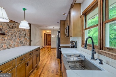 This beautiful completely remolded Home in Sky Valley offers one on Sky Valley Resort and Country Club in Georgia - for sale on GolfHomes.com, golf home, golf lot