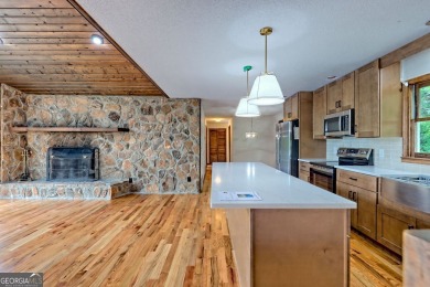 This beautiful completely remolded Home in Sky Valley offers one on Sky Valley Resort and Country Club in Georgia - for sale on GolfHomes.com, golf home, golf lot